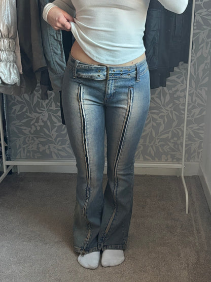 Denim flares with unique zip detail