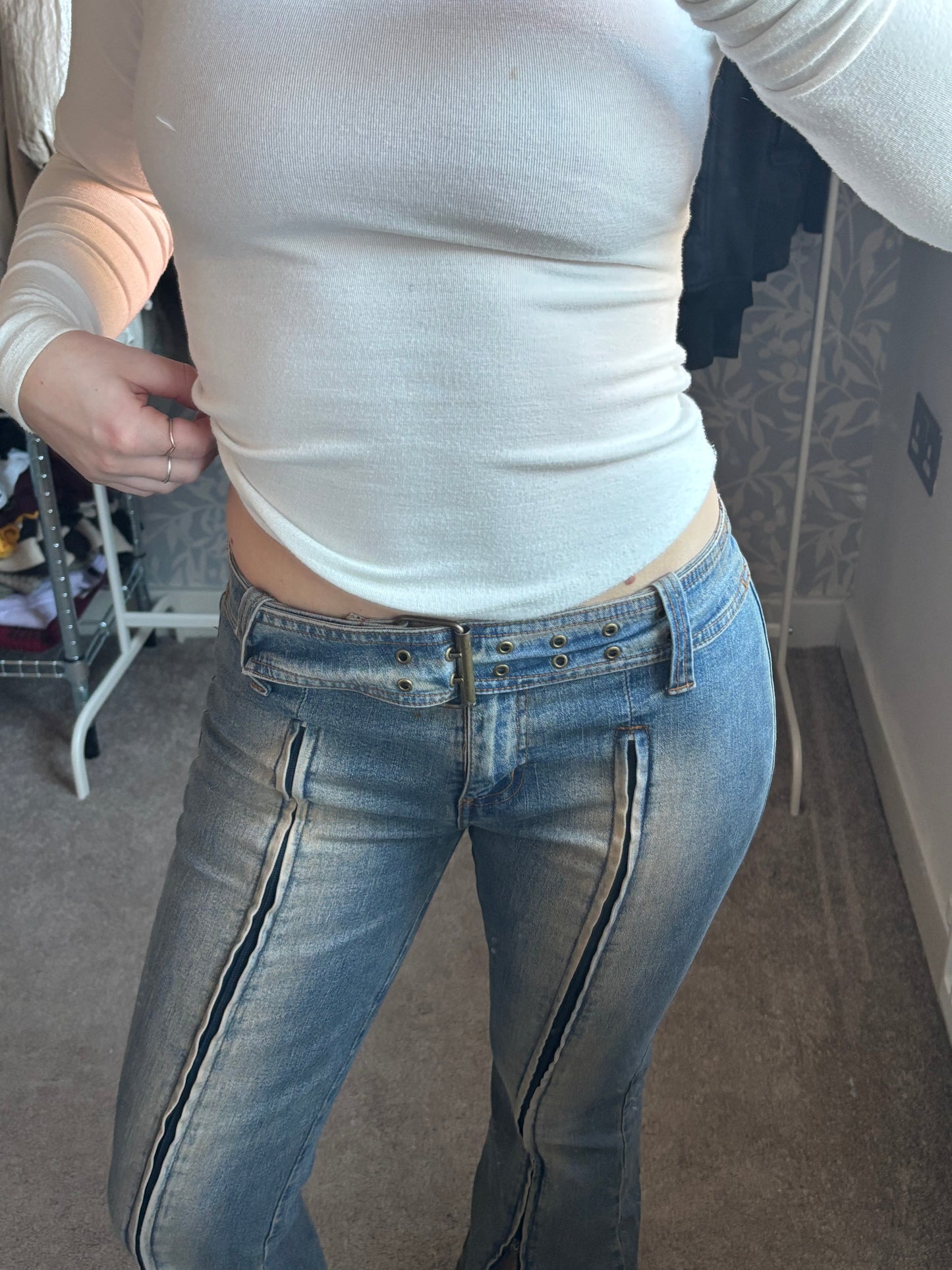 Denim flares with unique zip detail