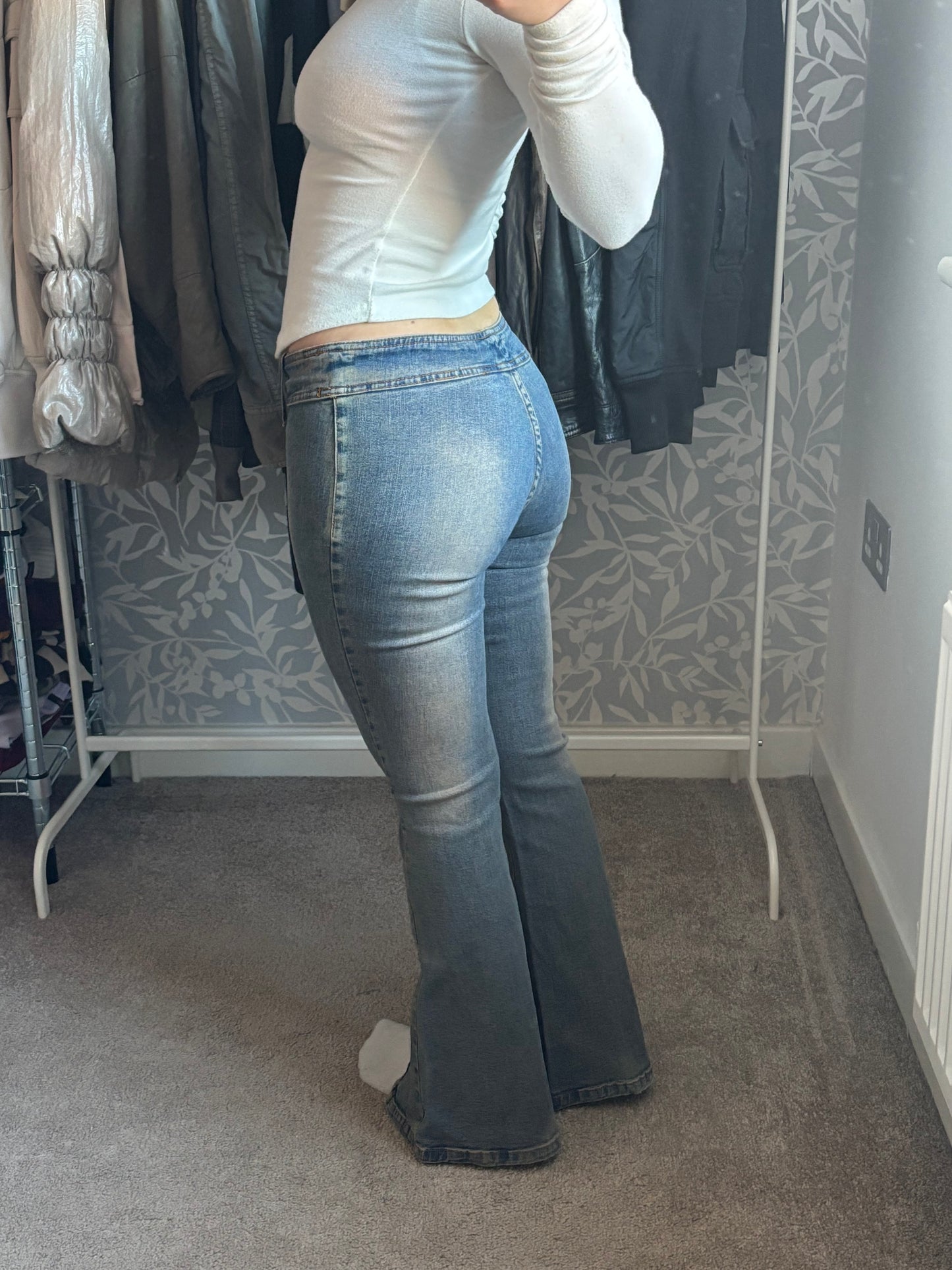 Denim flares with unique zip detail