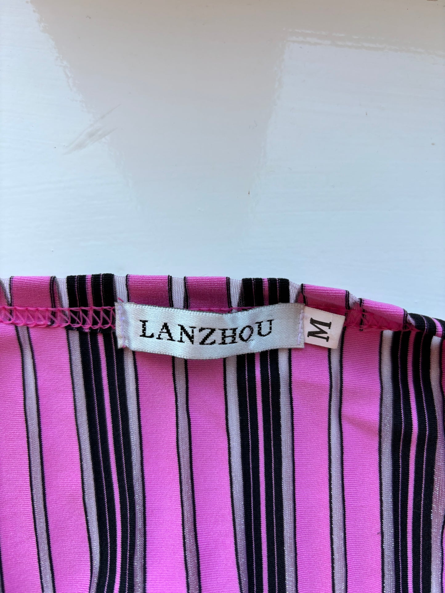 Striped pink crossover top